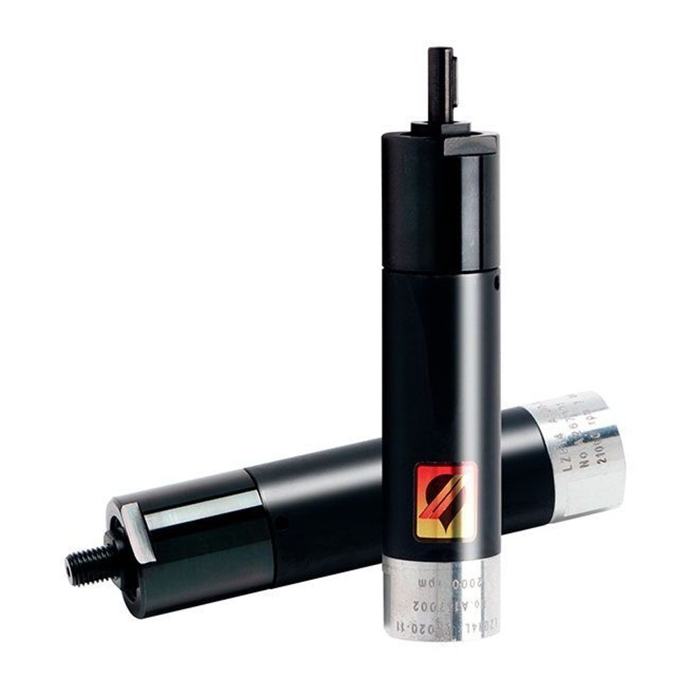 Black cylindrical metal motor, one standing vertically and one lying