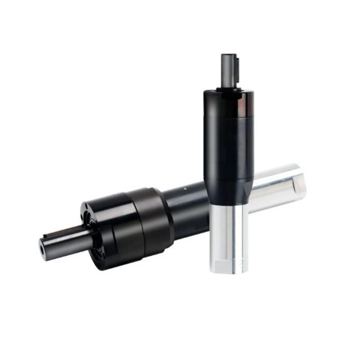 Two cylindrical air motors, one black and one silver, shown diagonally