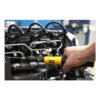 Close-up of a hand holding a yellow and black torque wrench
