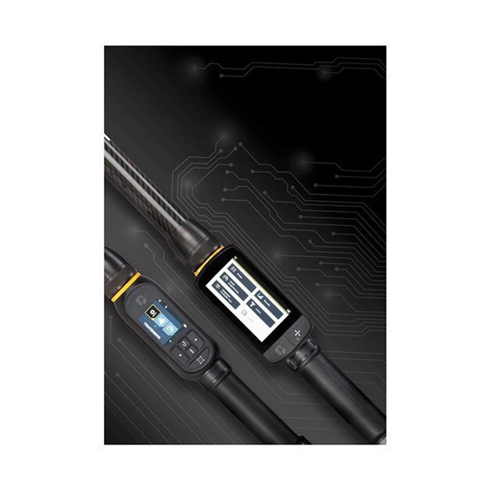 Two digital torque wrenches on a dark background with circuit-like lines