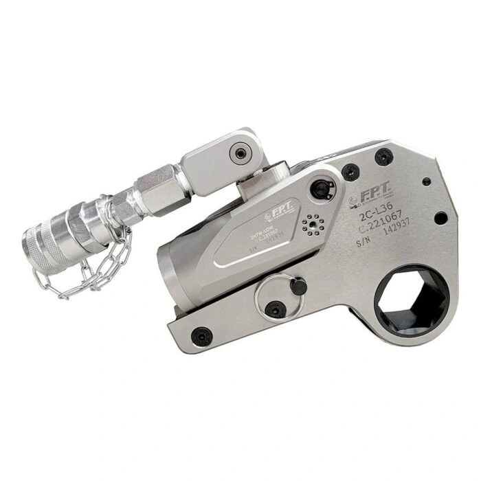 A silver-gray hydraulic torque wrench with attached hose and a hexagonal