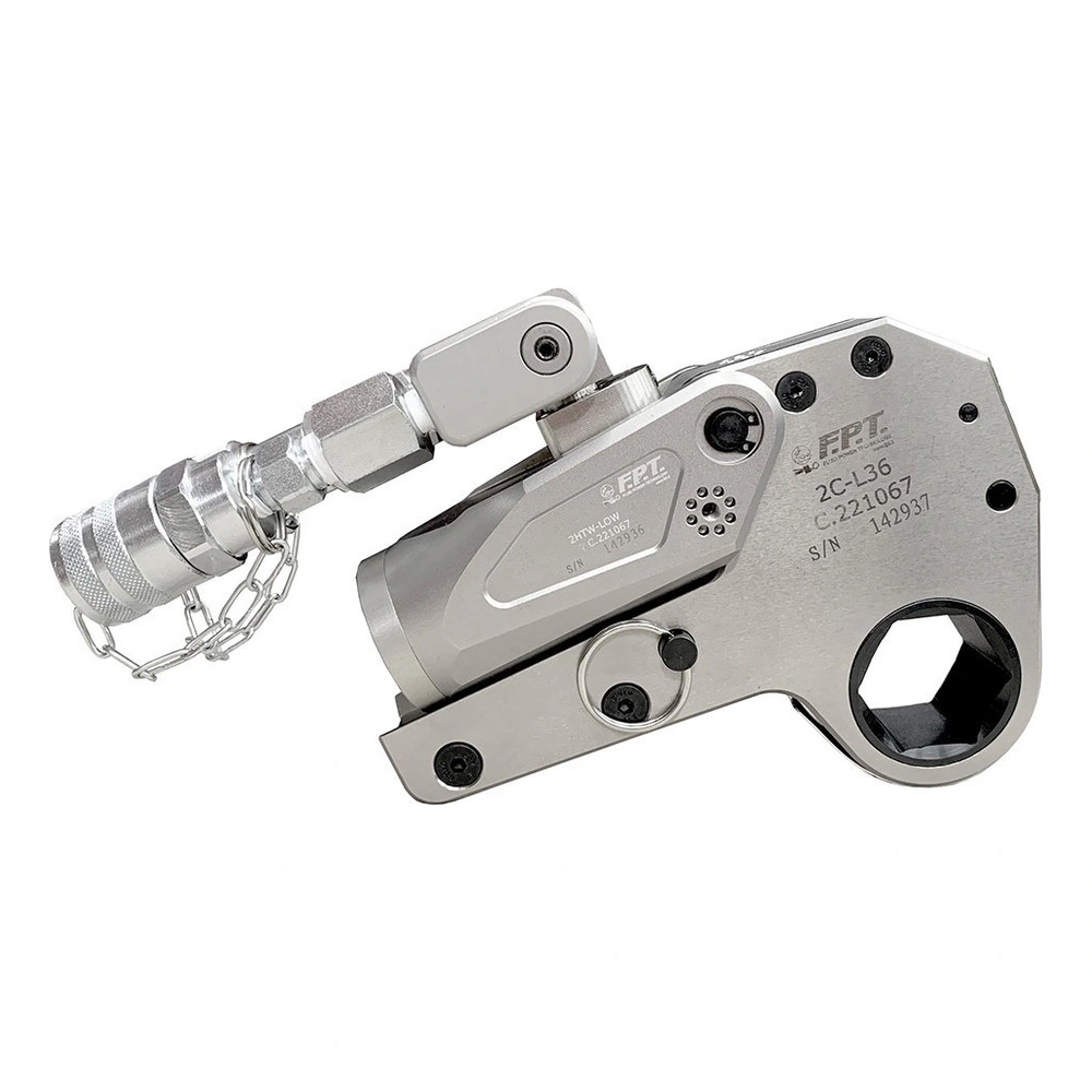 A silver-gray hydraulic torque wrench with attached hose and a hexagonal