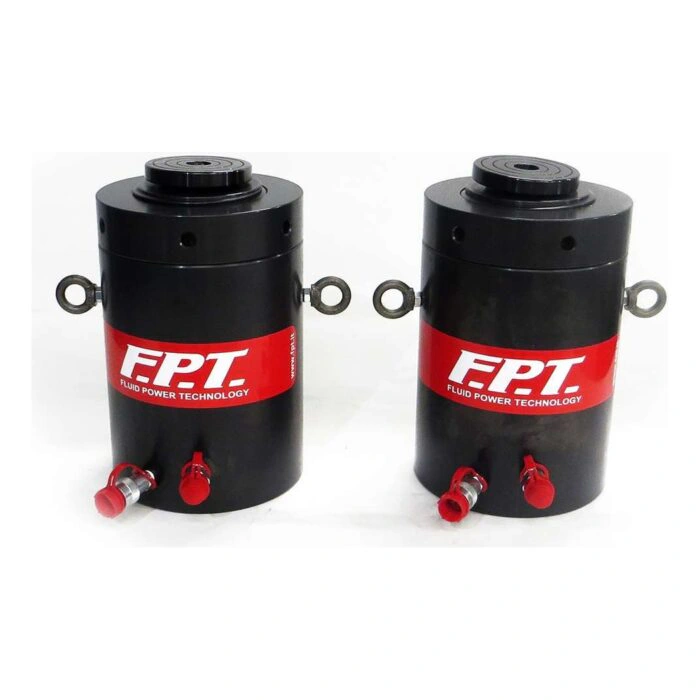 Two black hydraulic cylinders with red labels, lifting rings, and red oil