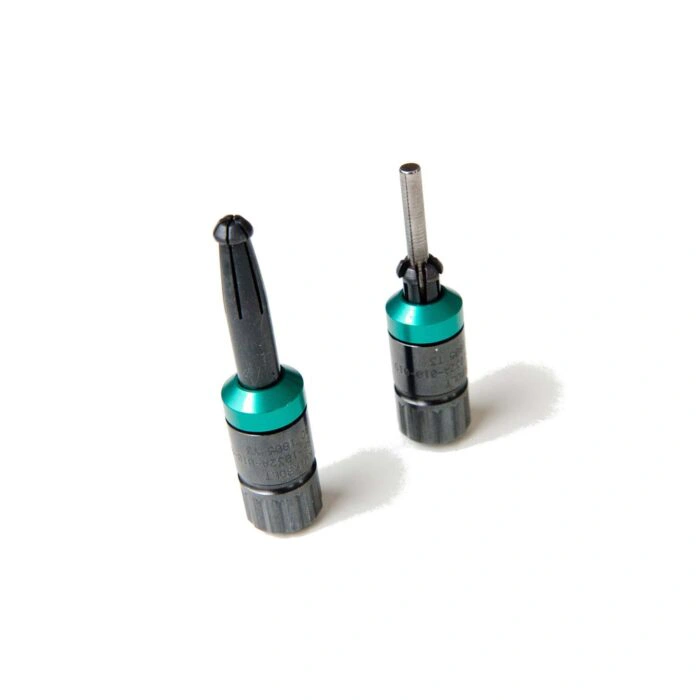 שני מחברים זמניים חד-צדדיים Kwikbolt Thunder על רקע לבן - Two Kwikbolt Thunder single-sided temporary fasteners on a white background