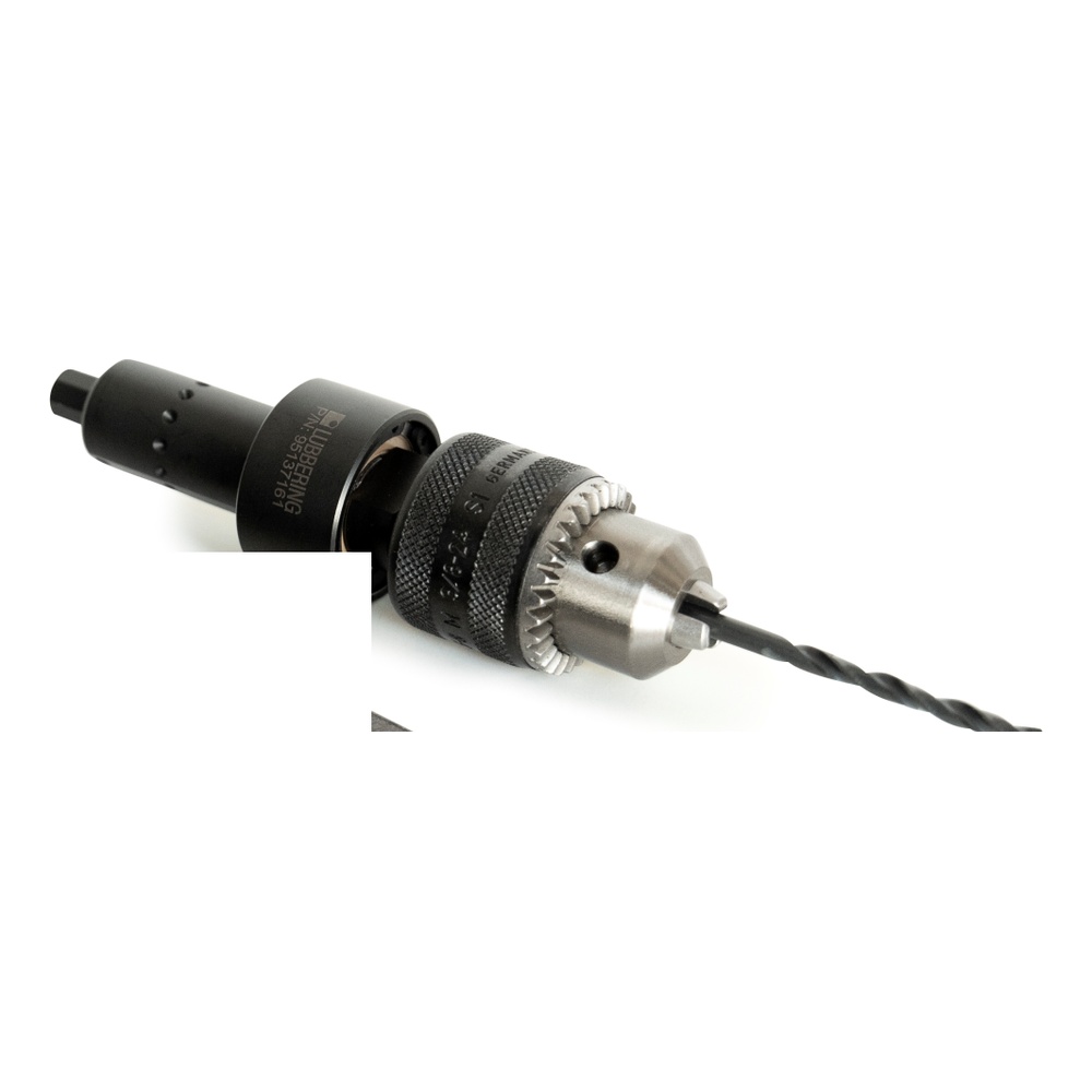 Photo of a black and silver angled drill head with a drill chuck and drill