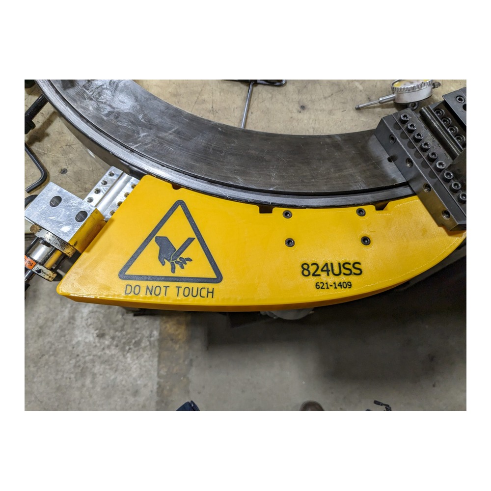 טריפר ושומר מרחוק ל-Clamshell בפעולה סביב צינור - Clamshell Remote Tripper and Guard operating around a pipe