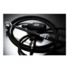 Torque wrench with a black cable or hose coiled around it, beside another