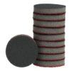 A stack of gray sanding discs with red edges, with one disc placed in front