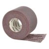 A reddish-brown mesh sanding roll standing on a white background