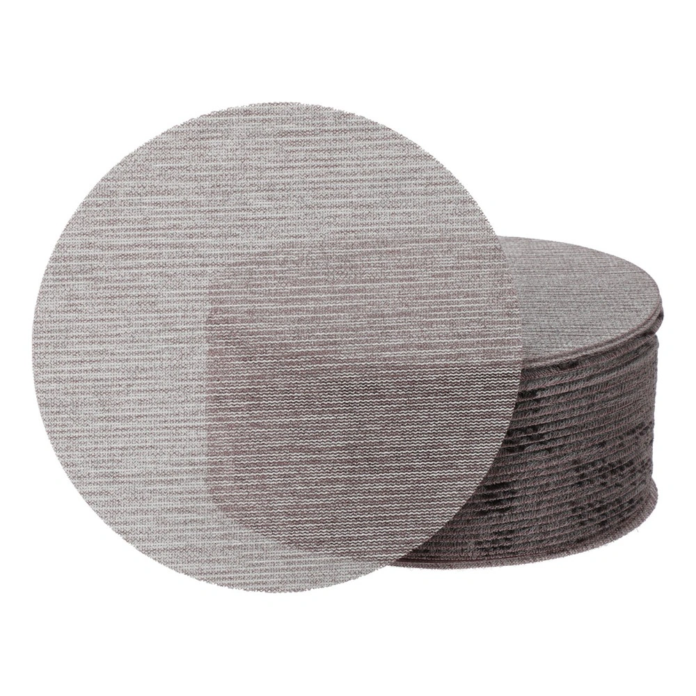 A stack of round sanding discs in gray-brown with one disc shown in front