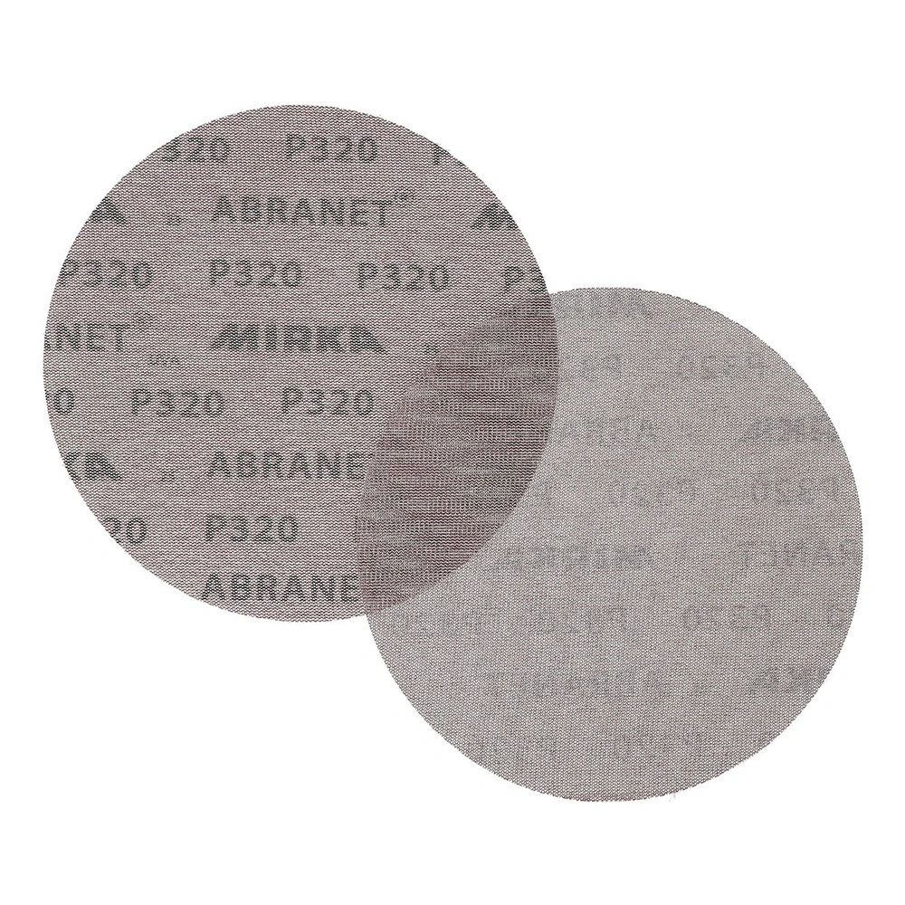 Two overlapping round sanding discs, one darker with printed text and one