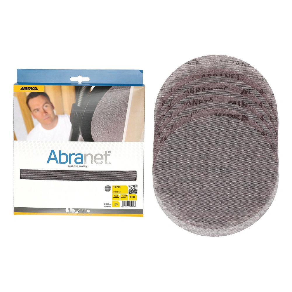 An open package of round mesh sanding discs beside a small stack of loose