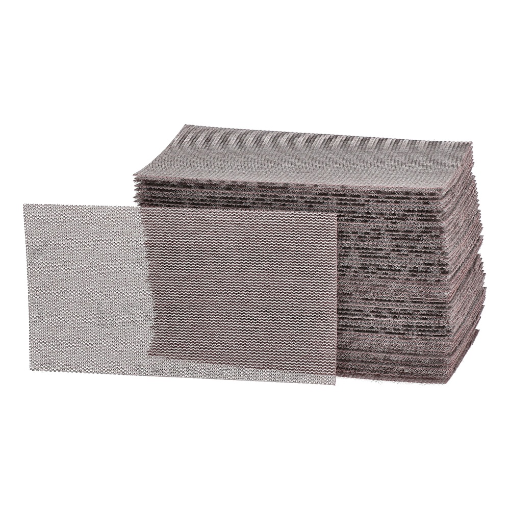 A stack of rectangular brown-gray mesh sanding sheets, with one sheet placed