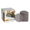 Packaging box with a stack of round mesh sanding discs and one disc shown