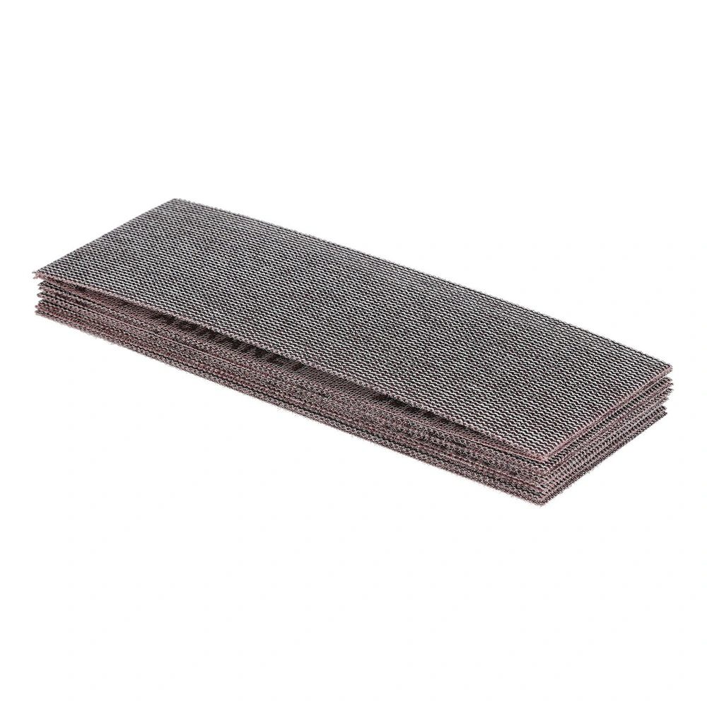 Stack of folded rectangular mesh sanding strips, shown at an angle