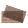 Two rectangular mesh sanding sheets in a brownish pink color, overlapping