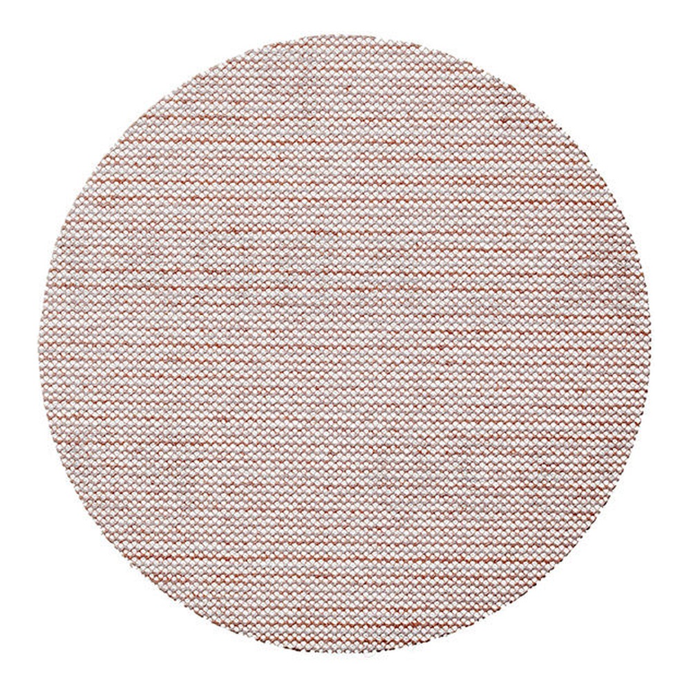 A round pink-brown mesh sanding disc on a white background