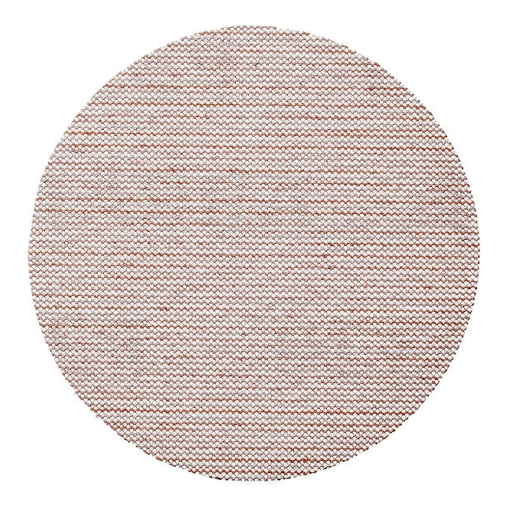 A round pink-brown mesh sanding disc on a white background