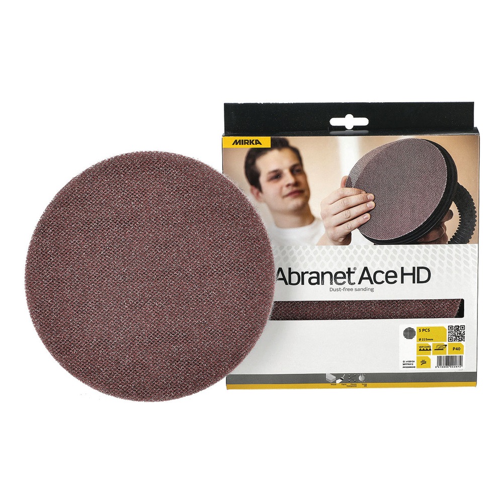 A round mesh sanding disc in front of a cardboard product package