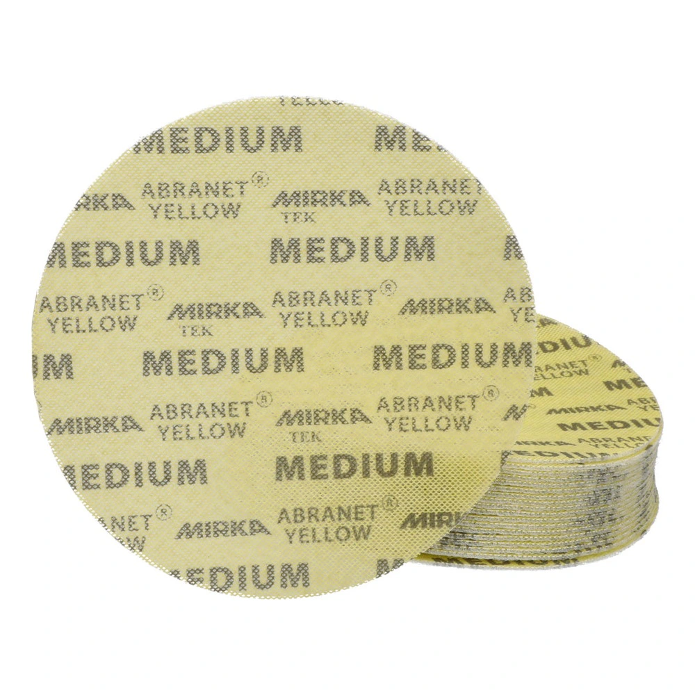 A stack of pale yellow sanding discs is shown at the back, with one large