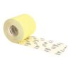 Roll of yellow abrasive paper with a sheet unrolled beside it, printed