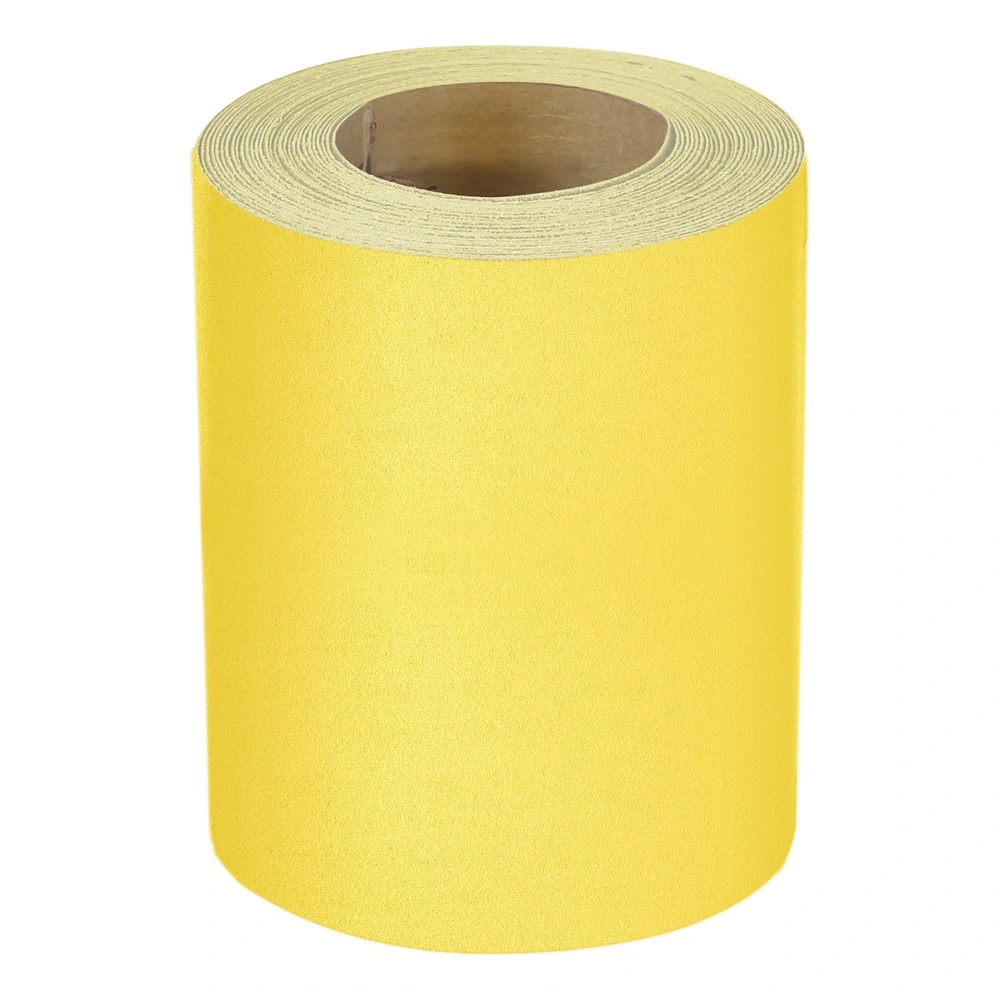 Yellow abrasive paper roll, shown from above with the cardboard core visible
