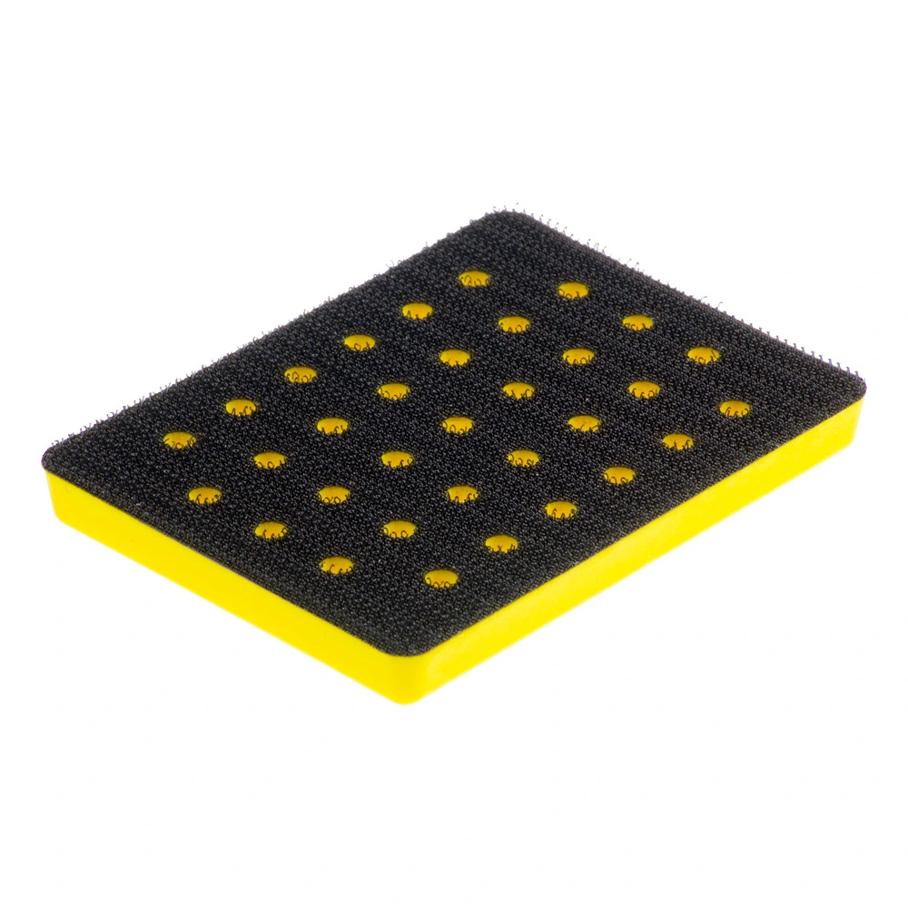 Rectangular black backing pad with evenly spaced holes and a yellow inner