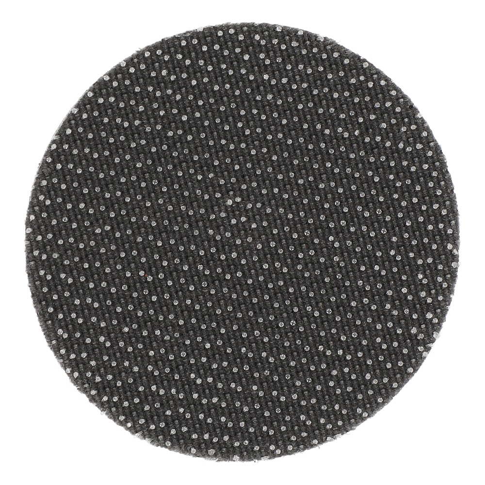 Close-up of a black round disk with a dense dotted pattern on its face