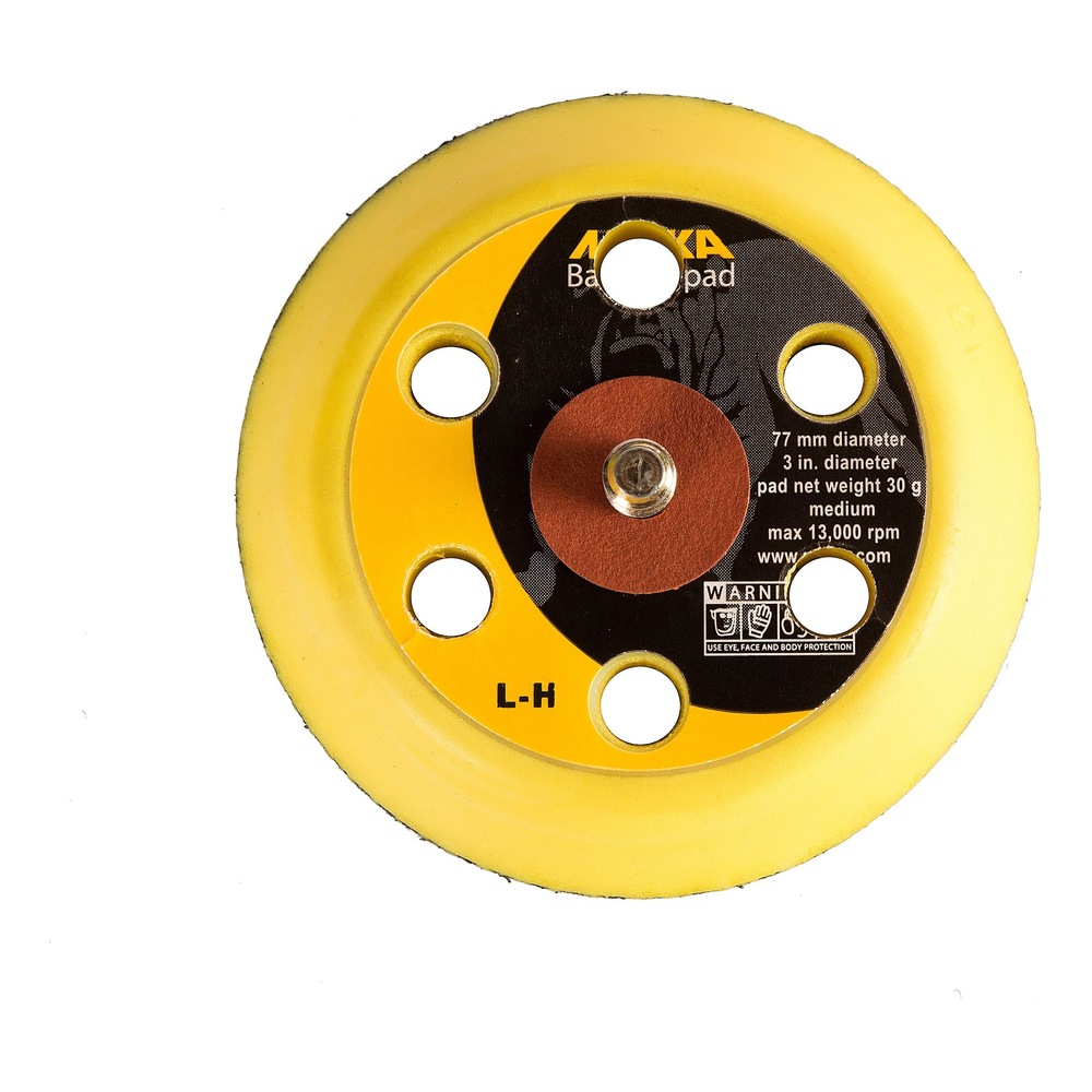 Yellow round backing pad with five vacuum holes and a threaded center, shown