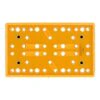 Underside view of a rectangular orange pad with many rows of round holes