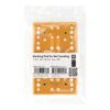 Clear plastic package containing a perforated orange rectangular pad