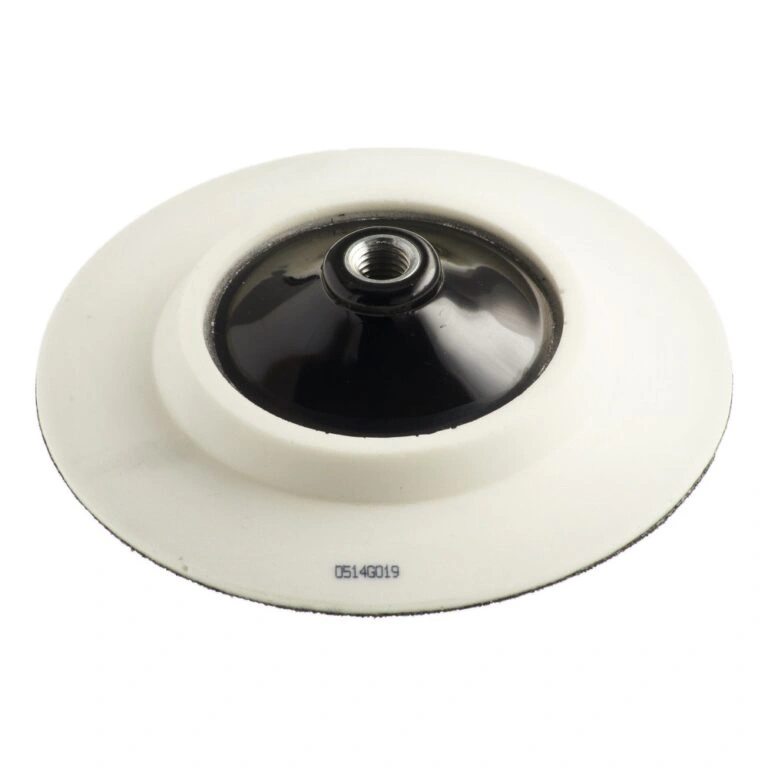 Round white and black backing pad with a metal center connector, rear view