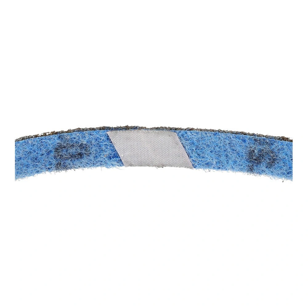 Close-up of a blue abrasive belt with a white splice section in the middle