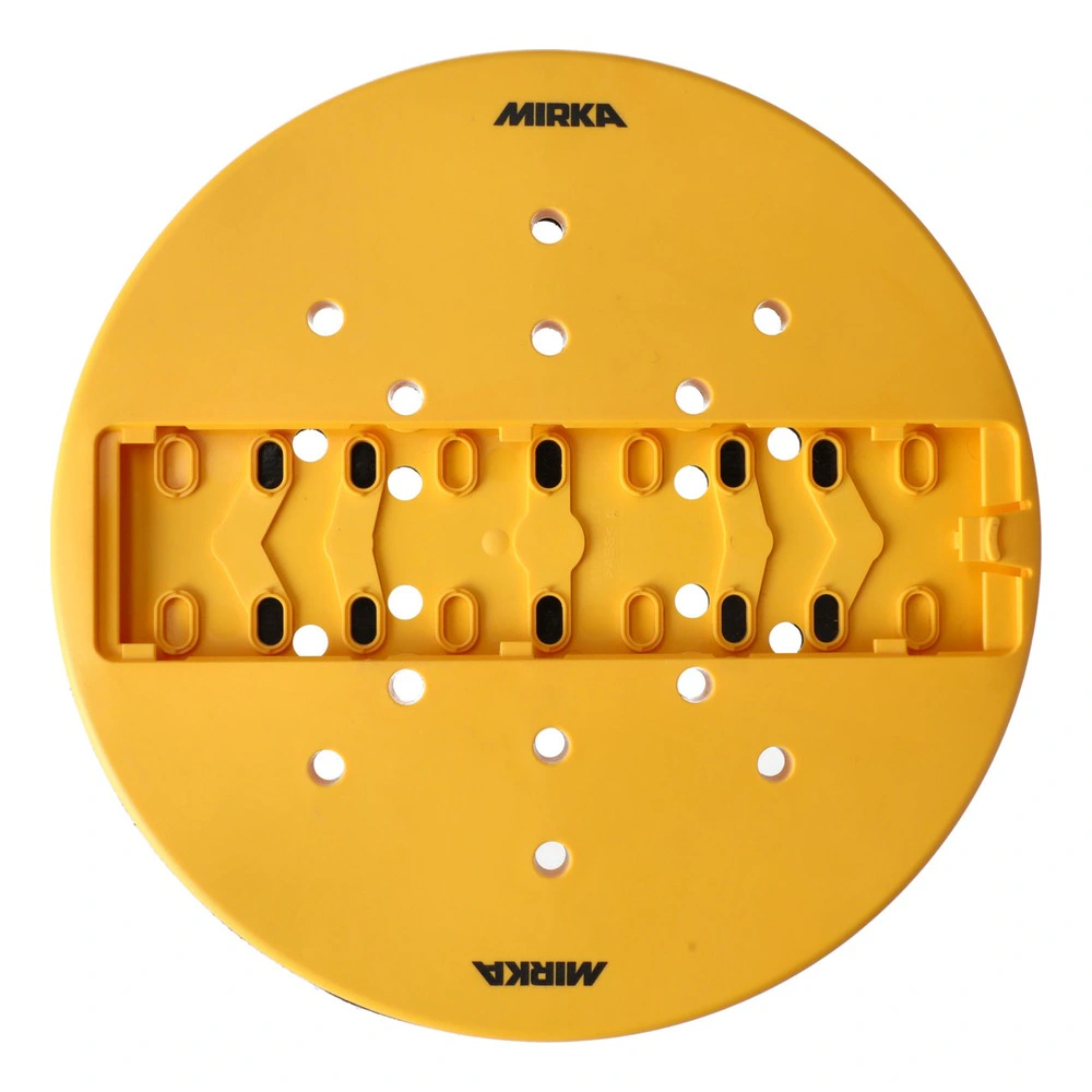 A round yellow sanding pad with many suction holes and MIRKA text, top view
