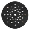 A round black sanding pad with a dense hole pattern, front view on a white