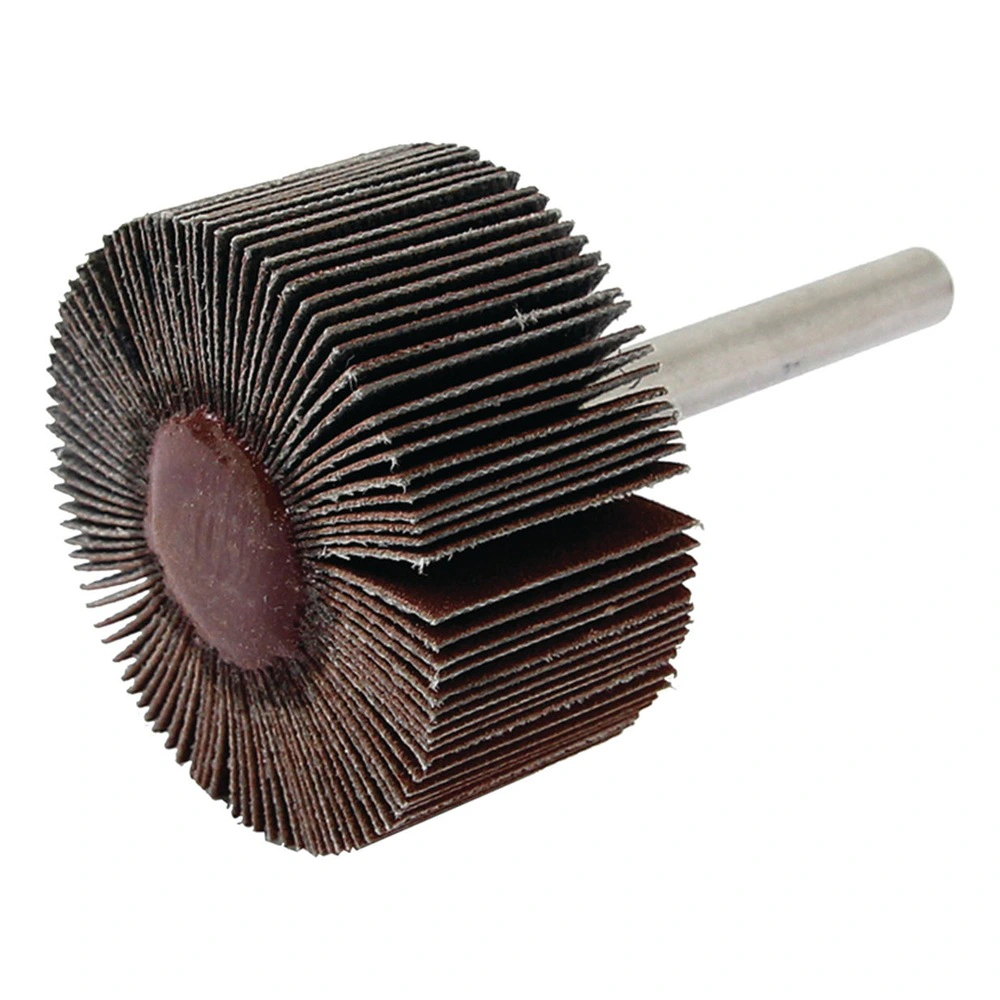 A flap wheel abrasive with a metal shank, shown at an angle on a white