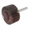 A flap wheel abrasive with a metal shank, shown at an angle on a white