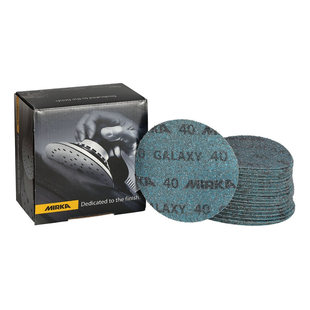 A stack of round sanding discs beside a black packaging box, with one disc
