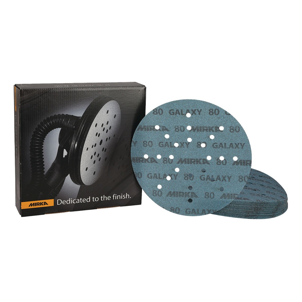 A blue-gray round sanding disc beside a partial stack of identical discs