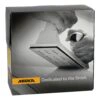 A black Mirka package box with a black-and-white photo of a hand sander