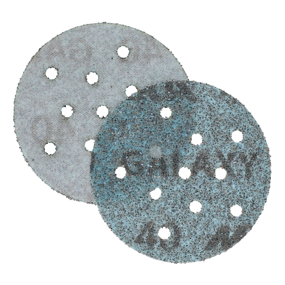 Two overlapping perforated round sanding discs