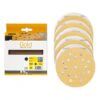 A boxed pack of sanding discs beside a stack of perforated round discs