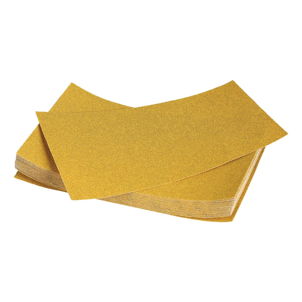 A stack of rectangular yellow sanding sheets on a white background