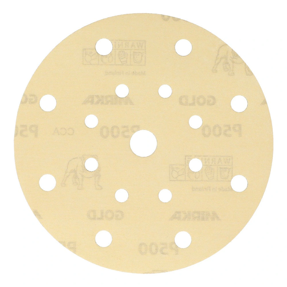 Light-colored round sanding disc with 17 holes and an open center