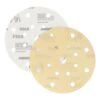 Two overlapping round sanding discs, one light and one yellowish, both