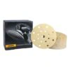 Black Mirka box beside a yellowish sanding disc and a stack of identical