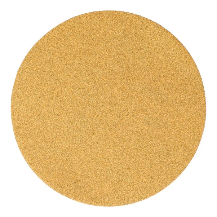 Round gold abrasive disc on a white background, front view
