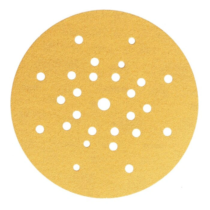 Round gold sanding disc with a dense hole pattern, shown front-on against