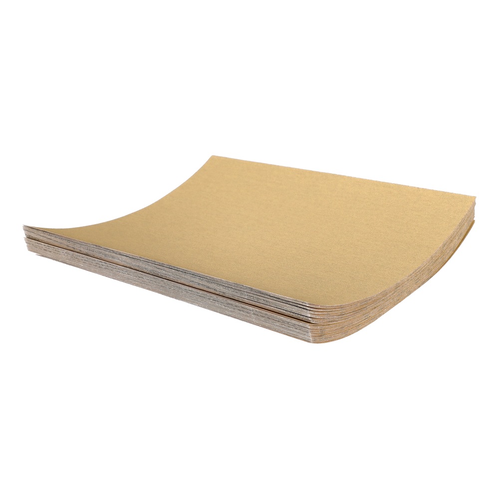 Stack of brown sanding sheets, angled view