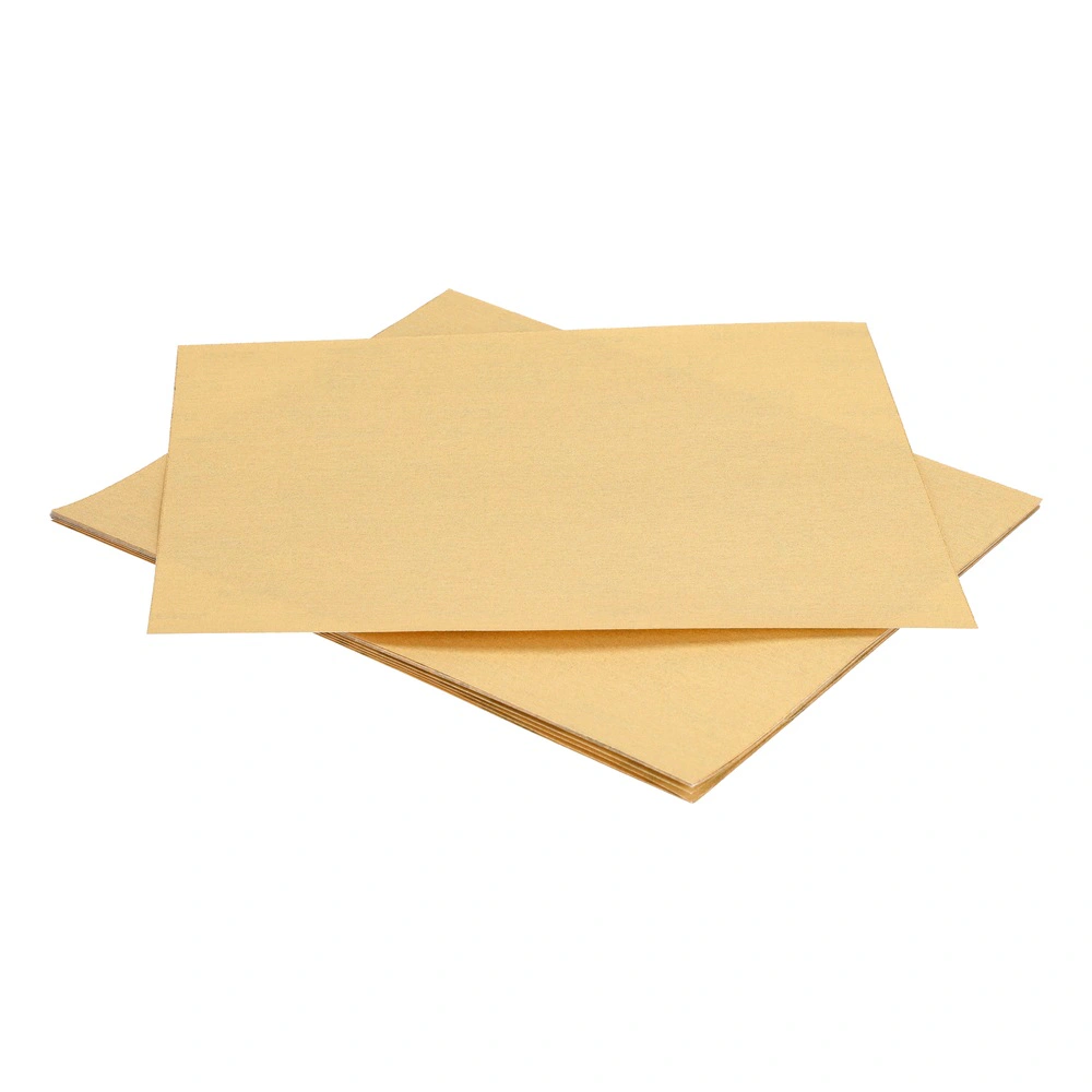 Rectangular yellow-gold sanding sheets stacked